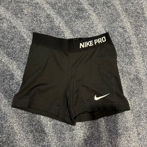Black Nike pro spandex shorts.